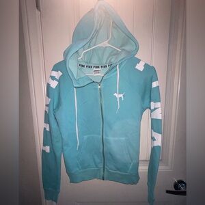 Kids XS baby blue used pink zip up sweater